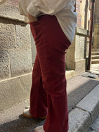 Jean large évasé rouge brique